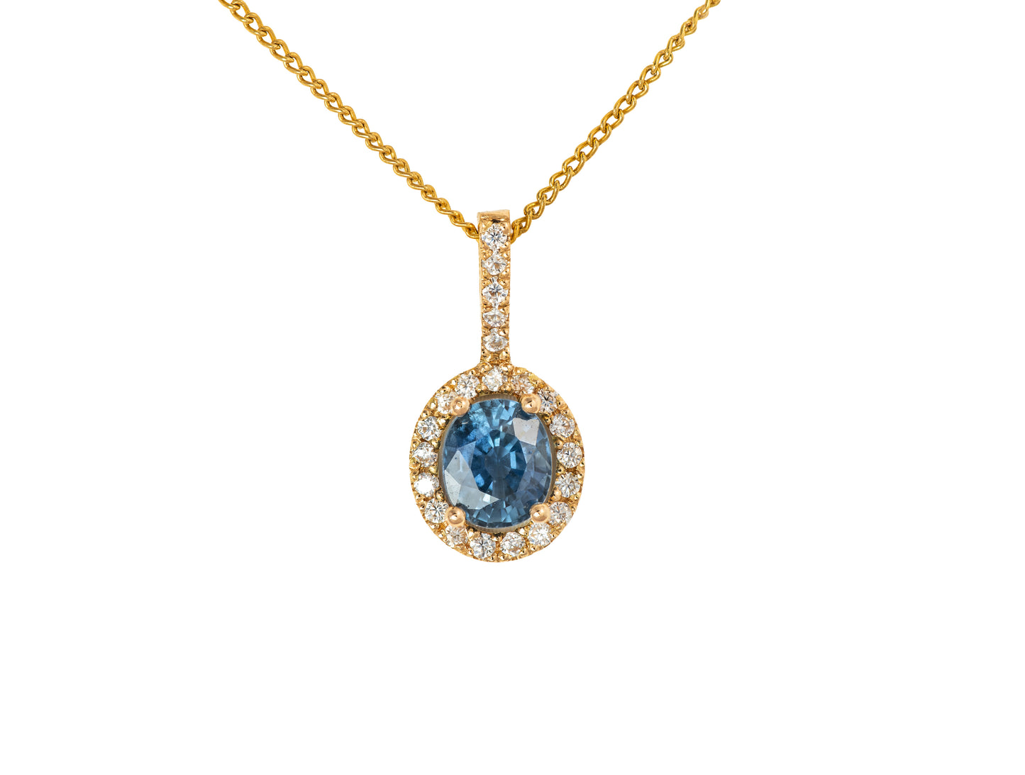 Dije de oro 18k con Zafiro Natural