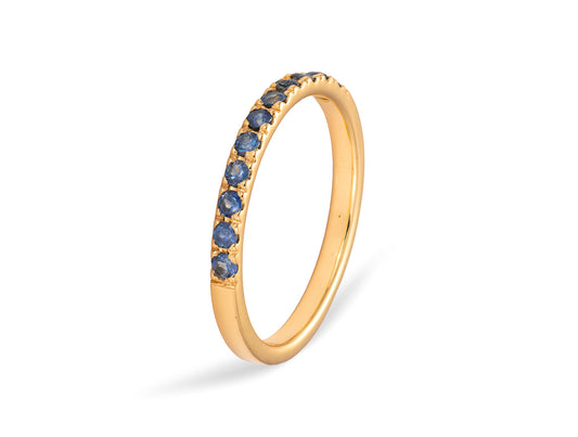 Anillo medio riviere en Oro 18K con Zafiro Azul Natural
