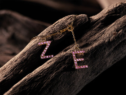 Par de Dijes en Oro Amarillo 18K con Zafiros Rosa Naturales
