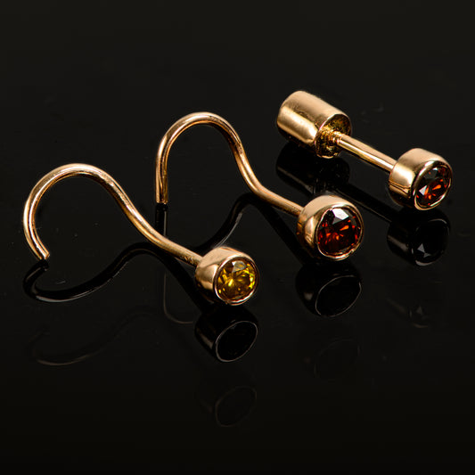 Piercings de oro 18k con Diamante de color