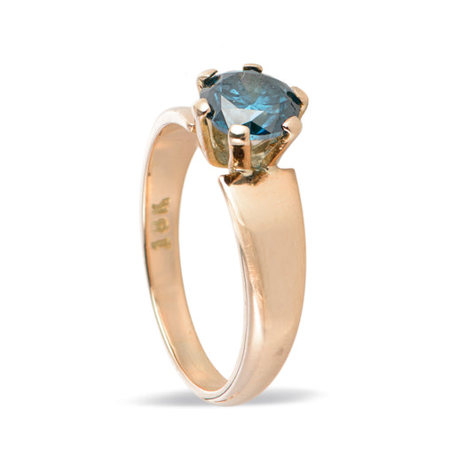 Anillo de oro 18k con diamante azul natural